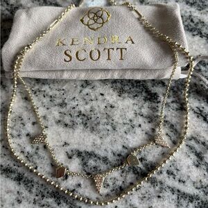 Gold double strand necklace